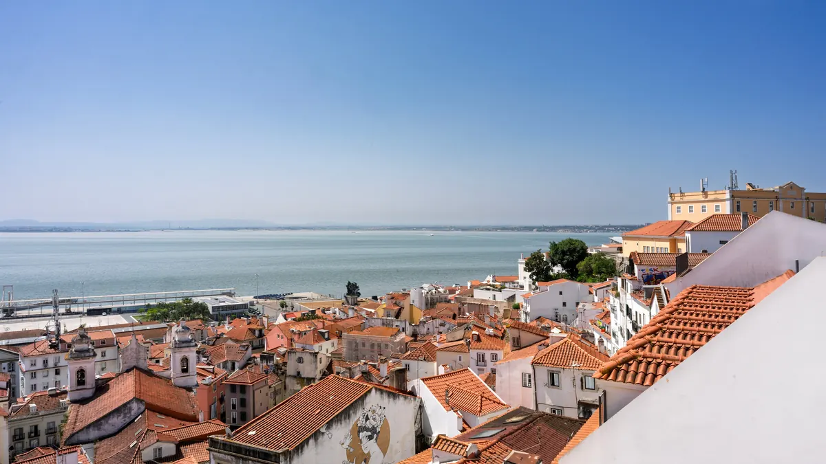 Rooftops of Lisbon's Alfama district and the Tagus River